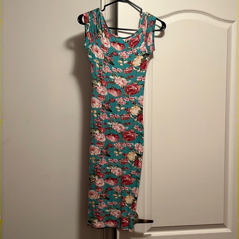 Summer dress, size M . Tight fit , beautiful for a walk on the beach